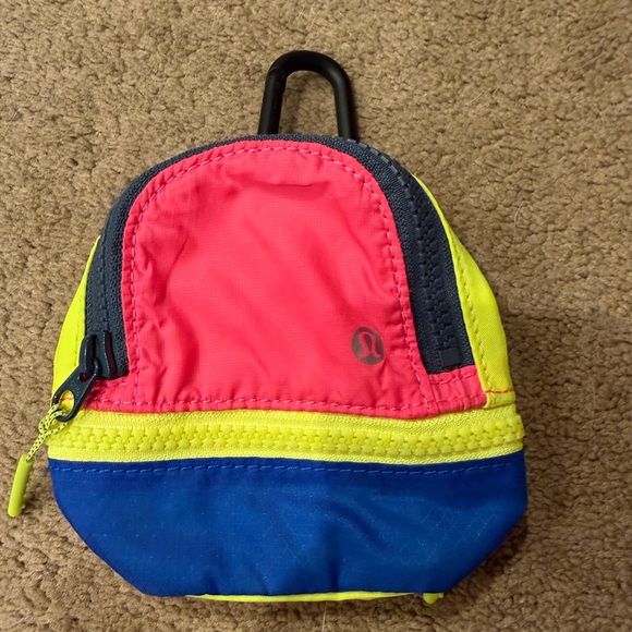 lululemon athletica Accessories - lululemon athletica Colorblock Clip Pouch in Pink, Yellow & Blue